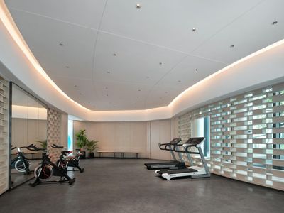 Minimalist fitness equipment on a clean floor.